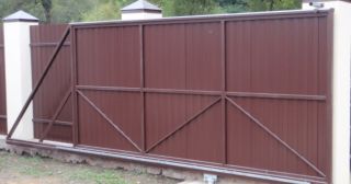 Купить откатные ворота из профнастила Красноуфимск, цена от 1757 руб.