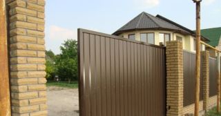 Купить откатные ворота из профнастила Красноуфимск, цена от 1757 руб.